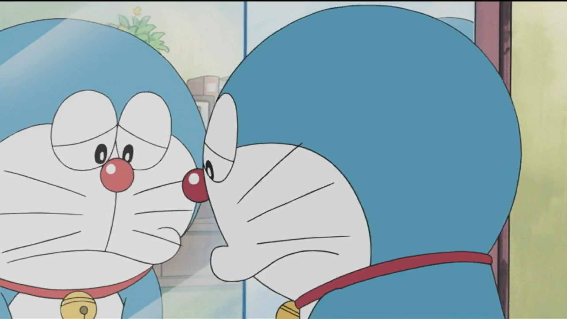 Hình Anime Doraemon buồn ngán đứng trước gương