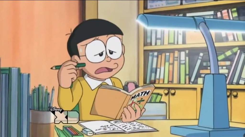 Hình Mặt Nobita Buồn chán khi học bài